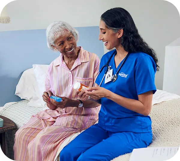 Healthcare professional with elderly patient